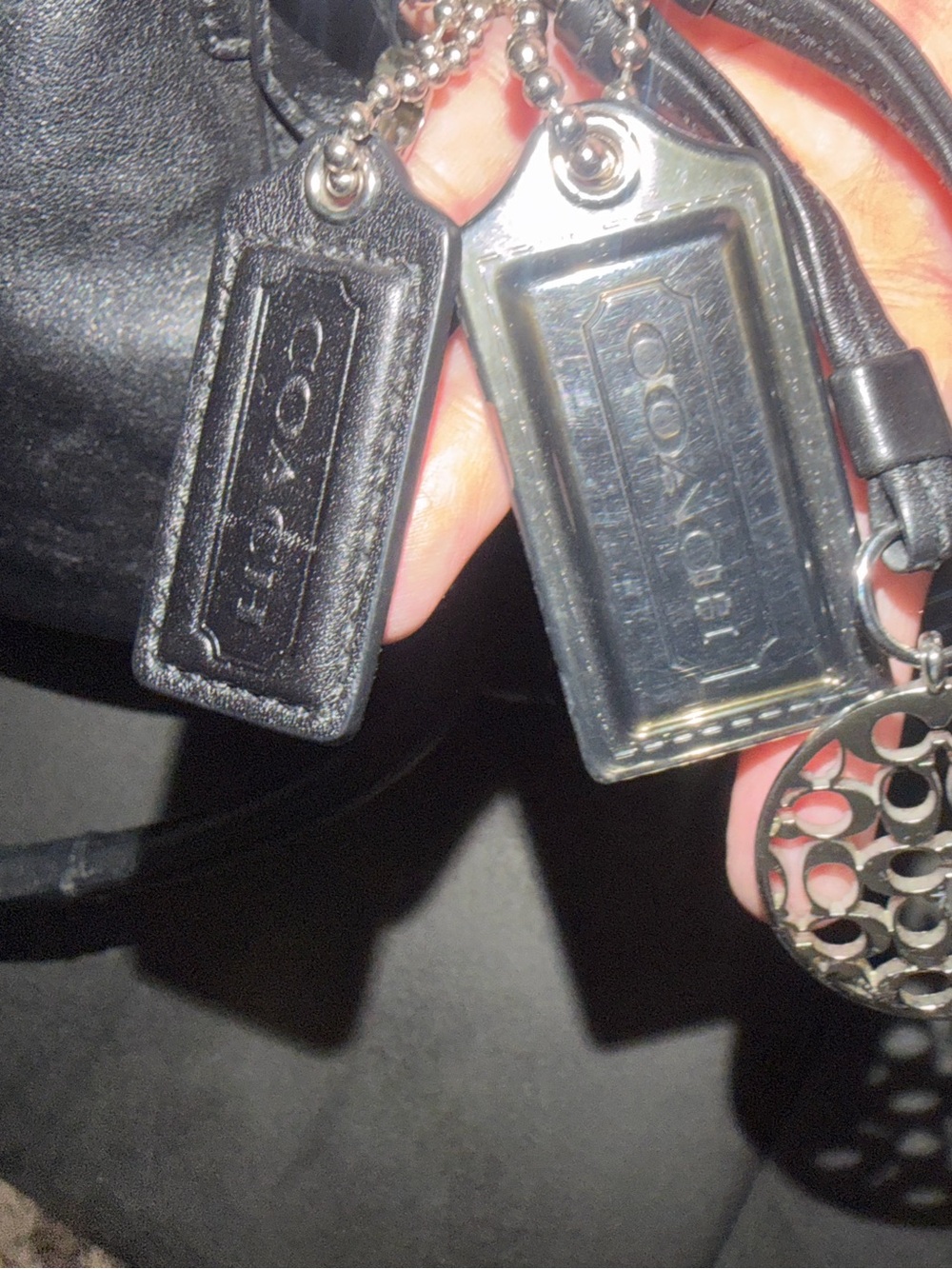 black leather Coach XL Hampton Tote featuring silver-tone hardware. - Picture 6 of 6